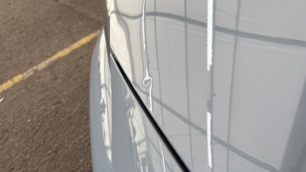 BMW I4 chips and dent