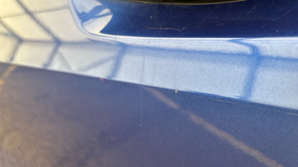 BMW I4 chips and dent