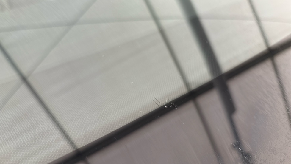 TESLA MODEL Y Bullseye chip and multiple small chips